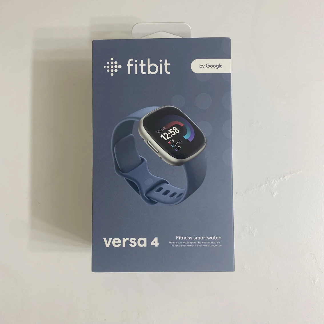 Google Fitbit versa 4 sliver and blue brand new in box