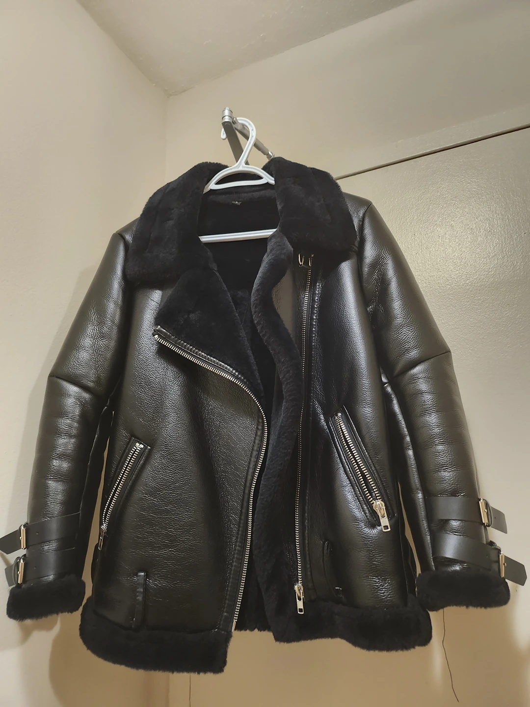 black woman leather jacket