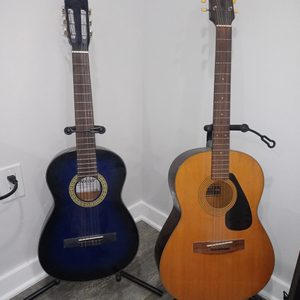 two acoustic guitar plus stand