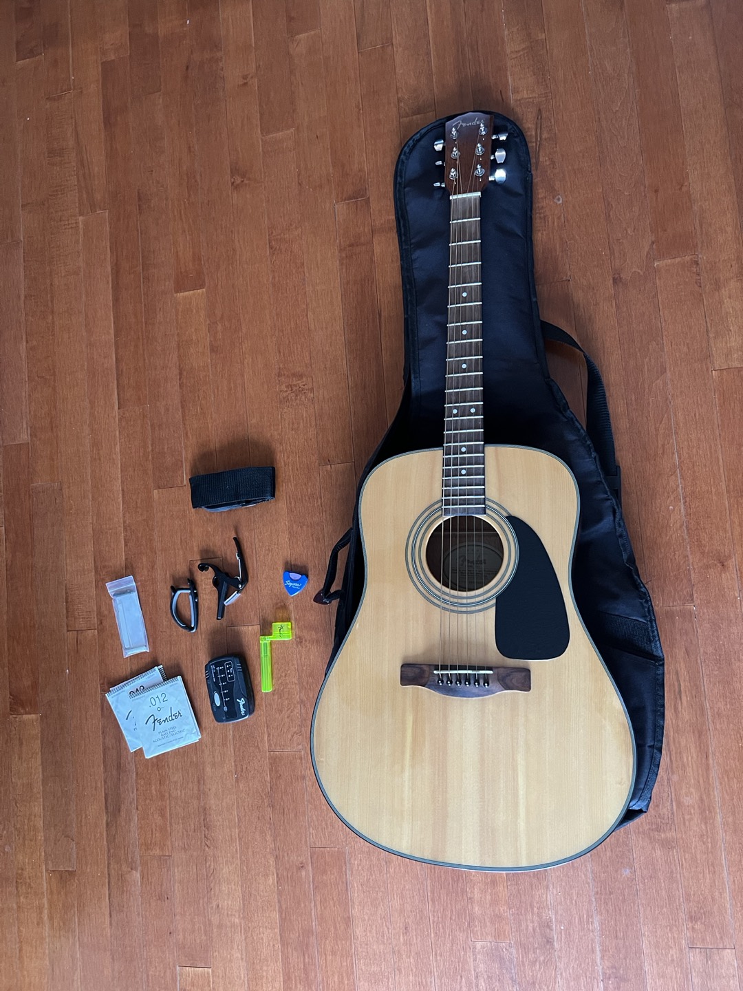 Fender acoustic guitar with accessories