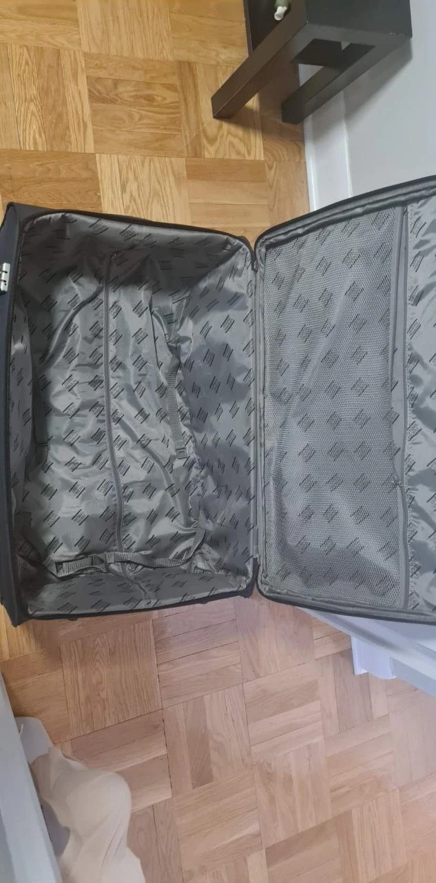 Large Suitcase with 2 wheels. - photo 2