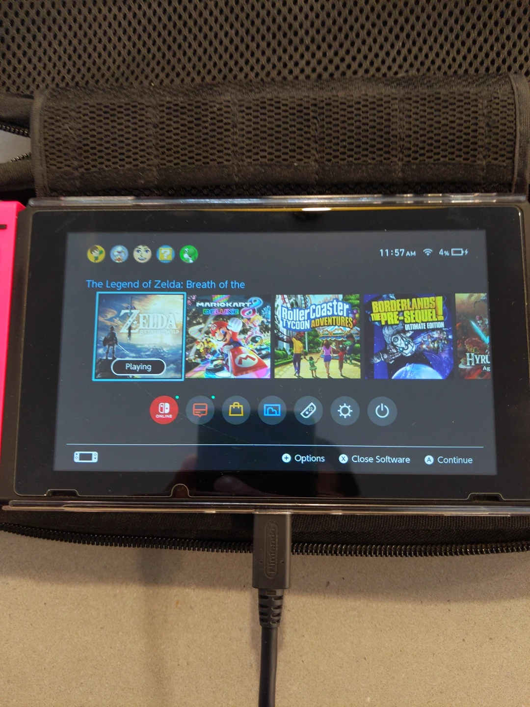 Nintendo Switch with Mario Kart, Zelda BOTW, and more games image indicator(2)