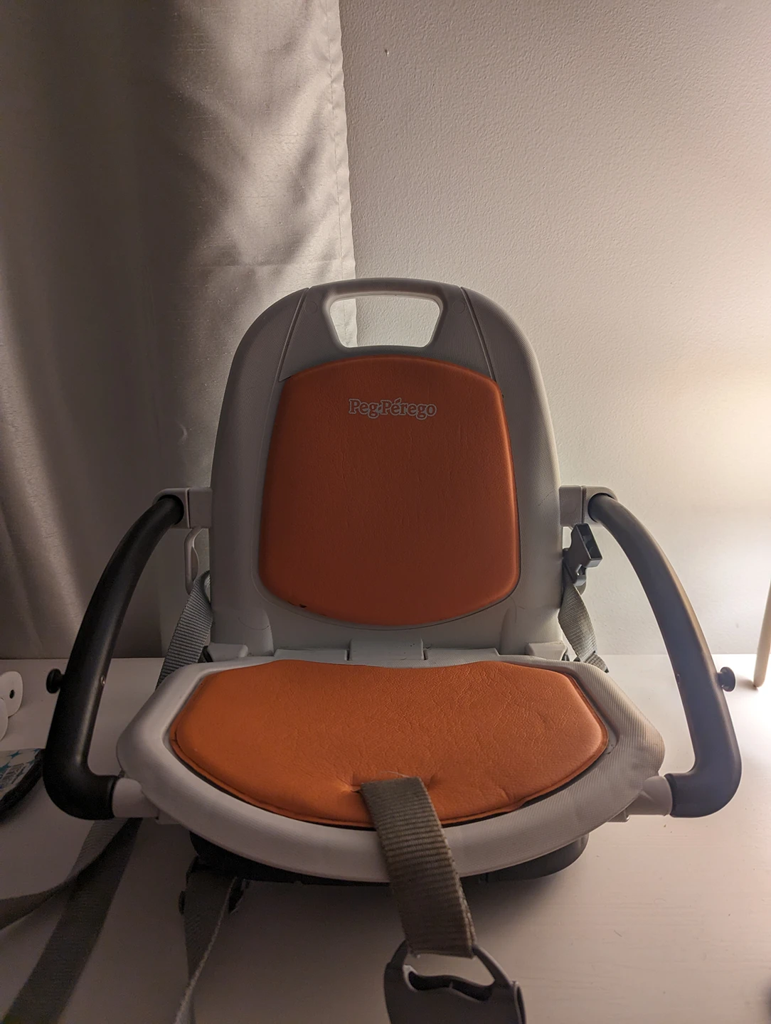 RIALTO FOLDING BOOSTER HIGH CHAIR  by Peg Perego