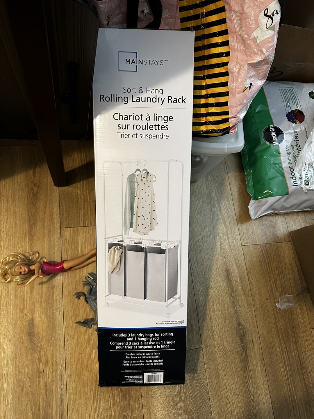 Laundry hamper sorter with hanger bar