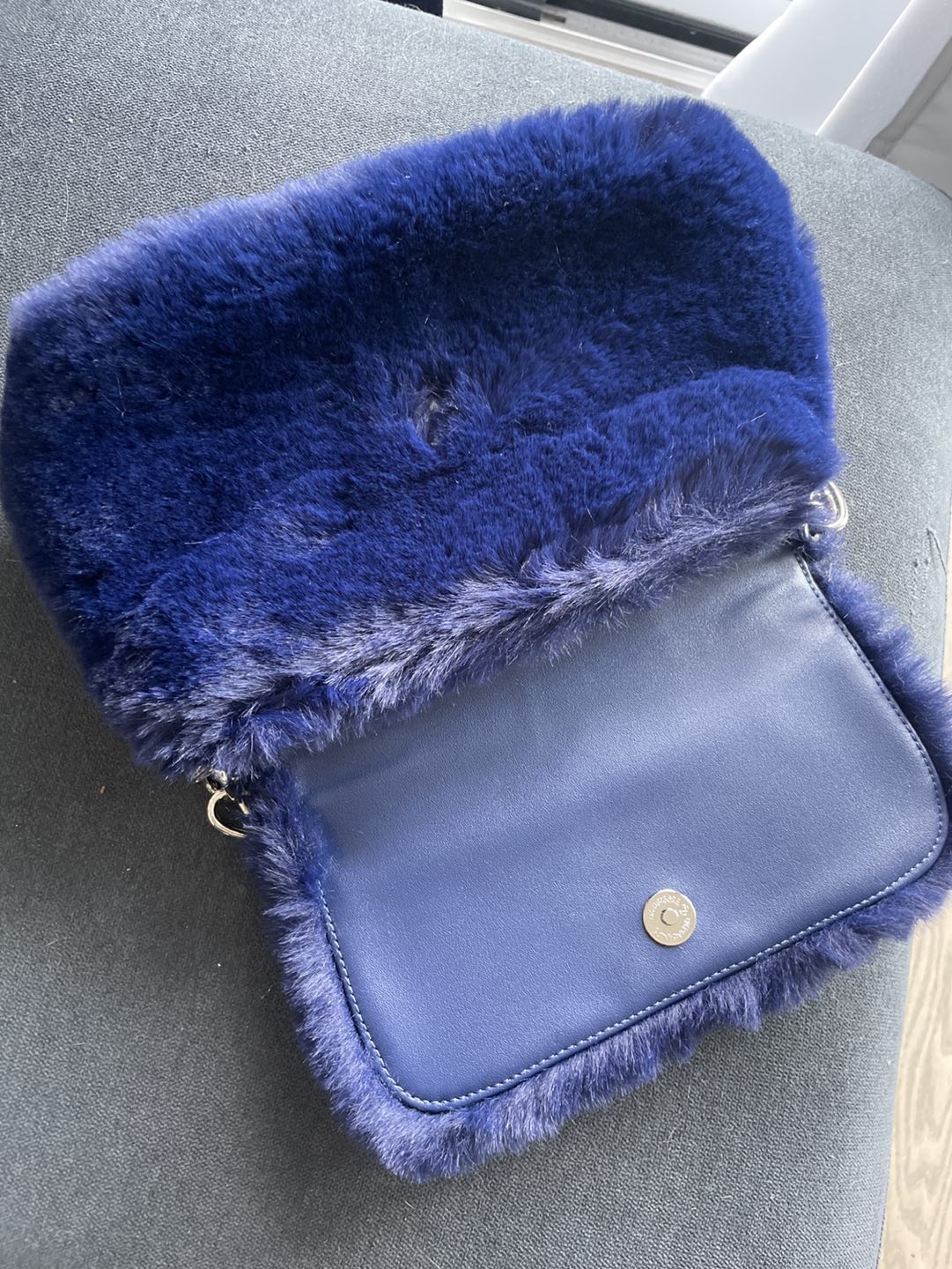 Fluffy navy blue purse image indicator(3)
