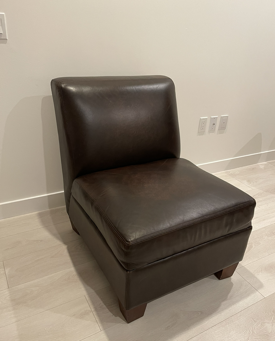 Brown leather chair (2 available)