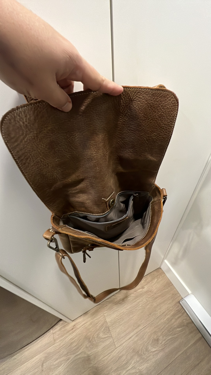 Roots leather bag