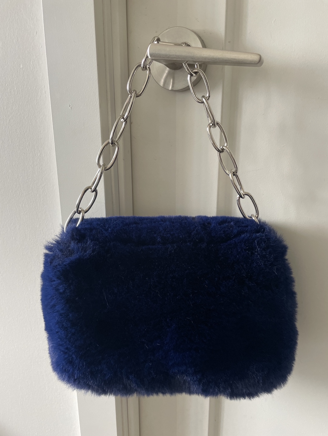 Fluffy navy blue purse image indicator(2)