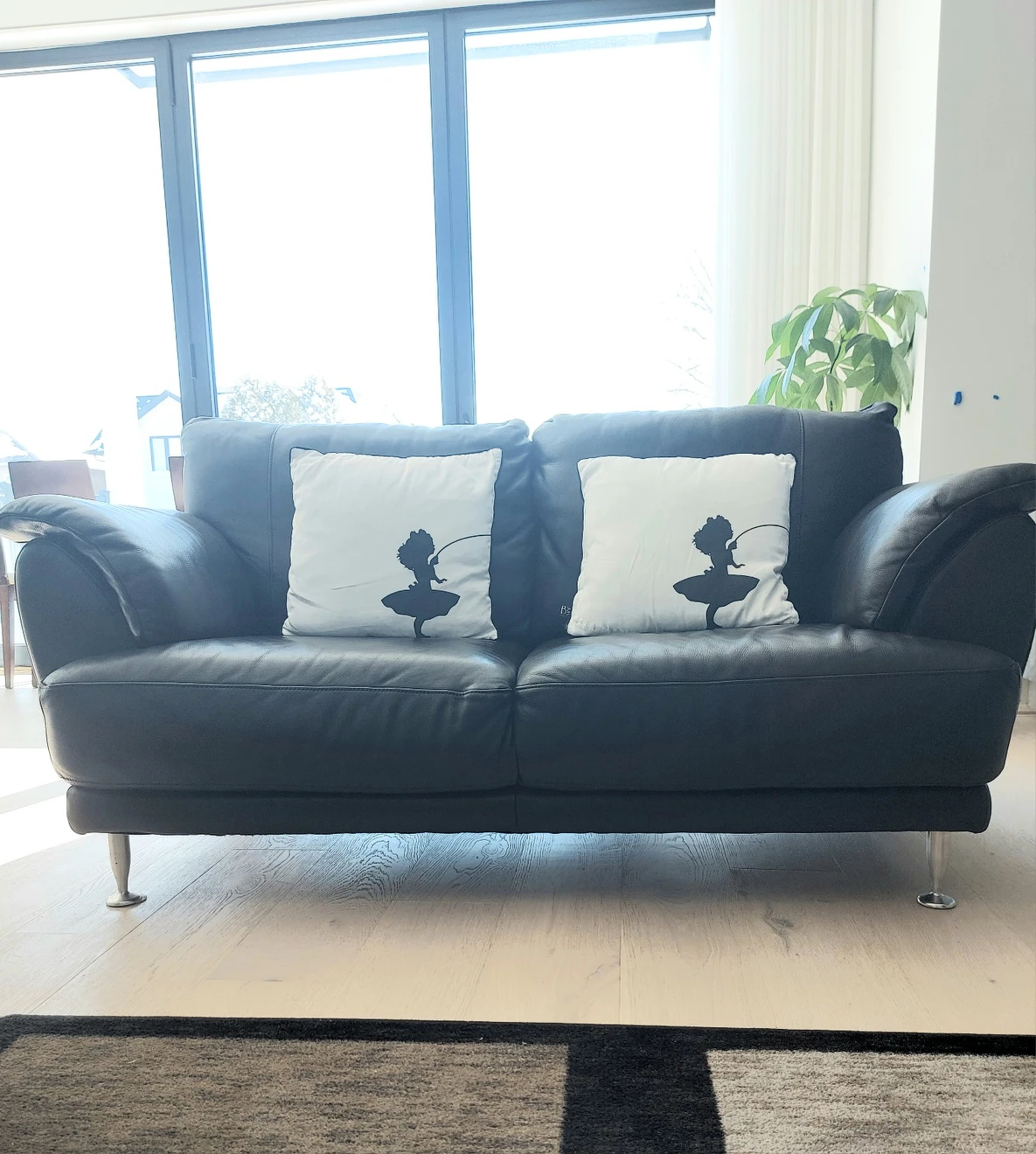 love seat black **Genuine Leather** plus area rug thumbnail