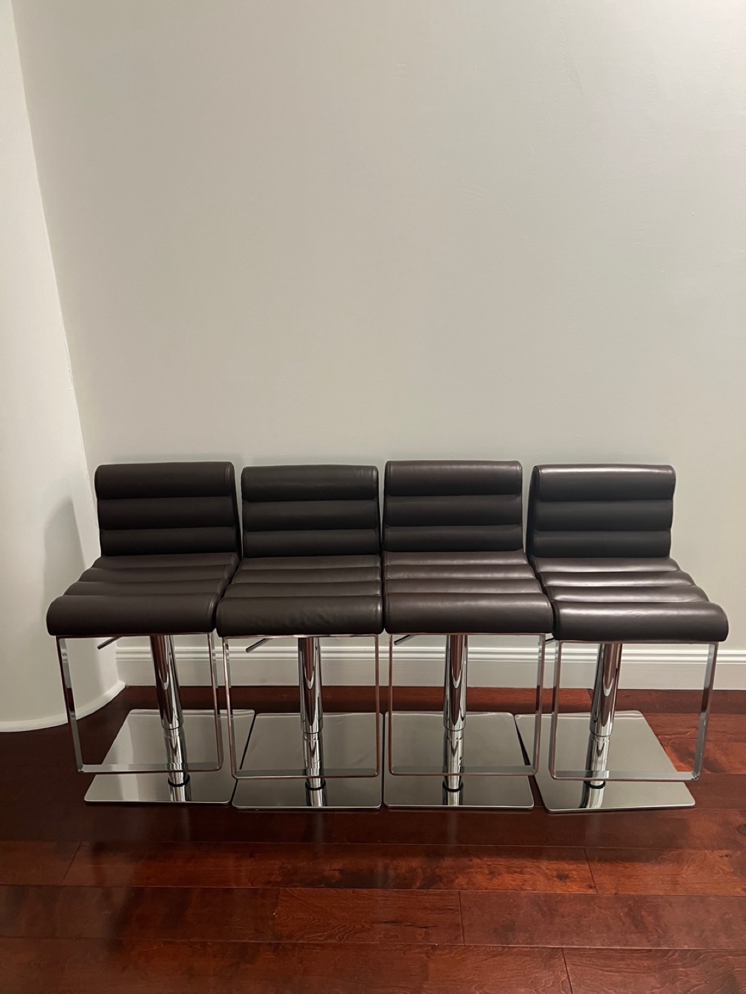 Jensen-Lewis brown leather bar stools