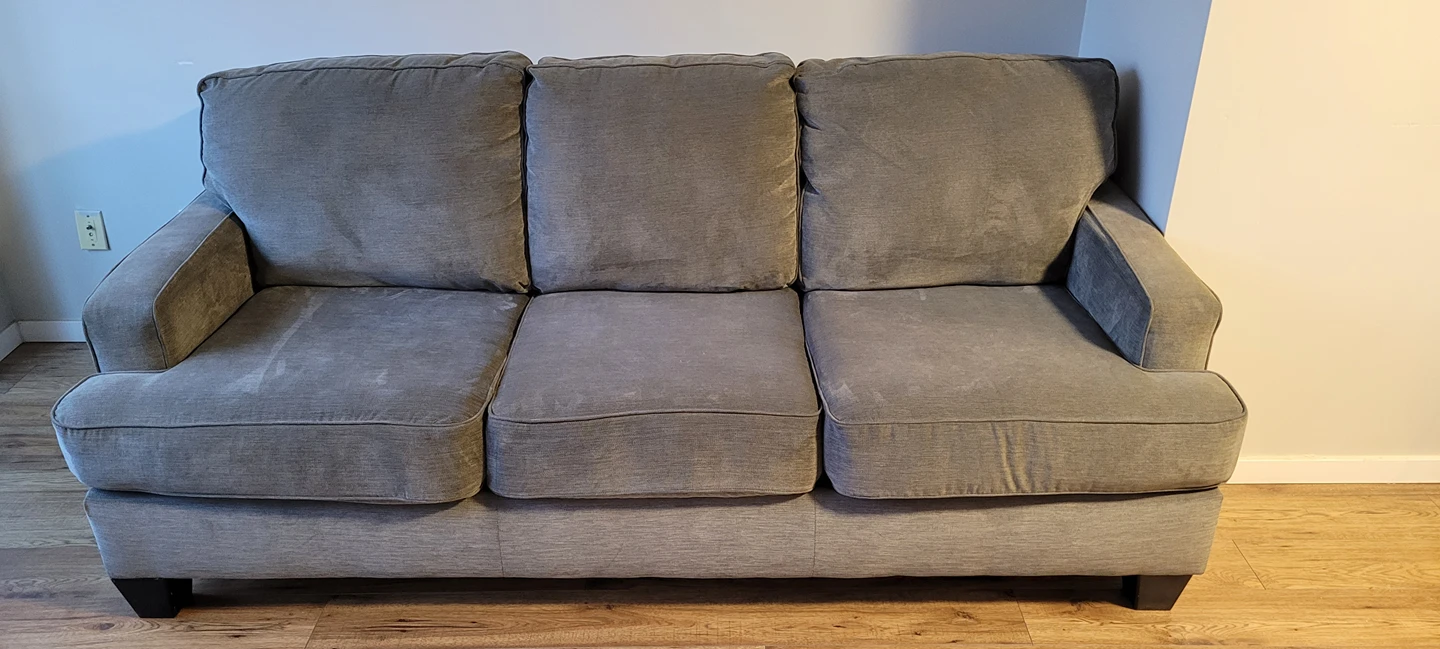 Grey suede couch with console table - photo 3