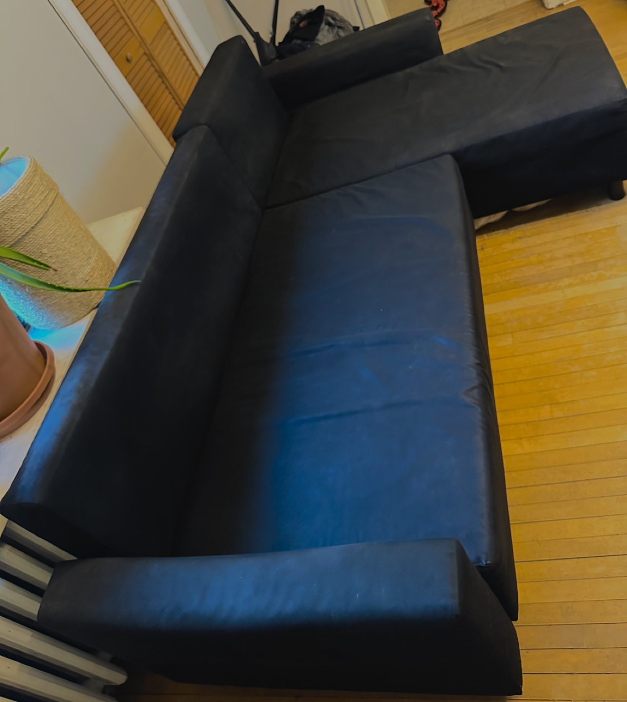 🚨NEEDS TO GO: Black convertible sofa with storage thumbnail