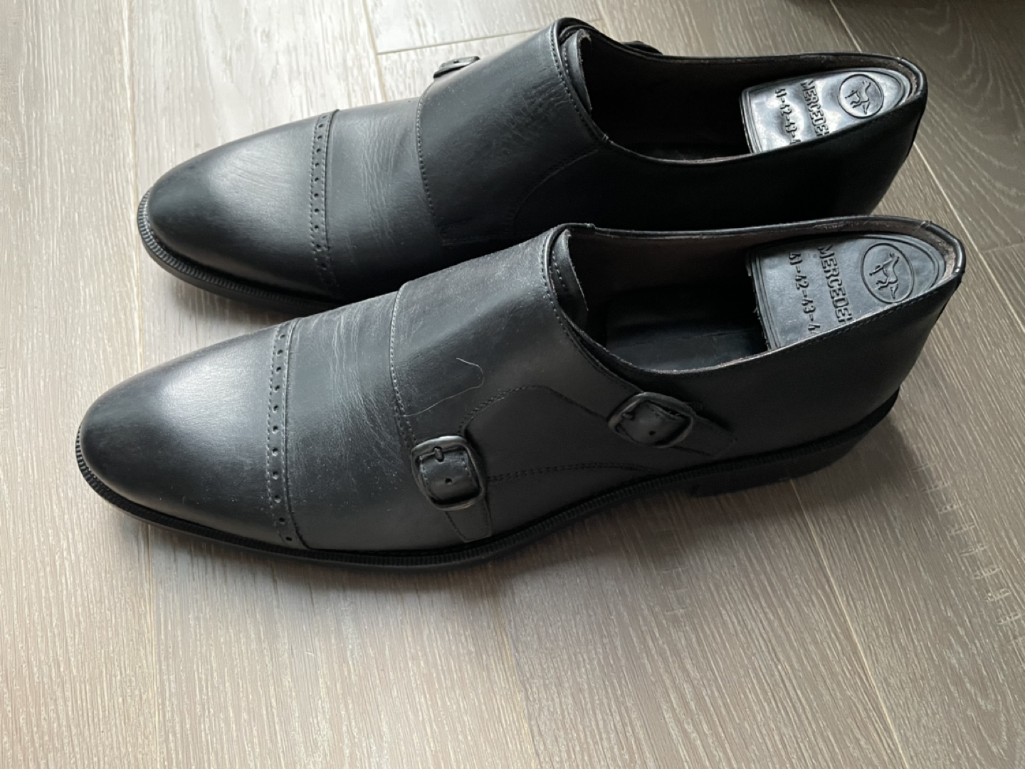 Men’s black leather dress shoes