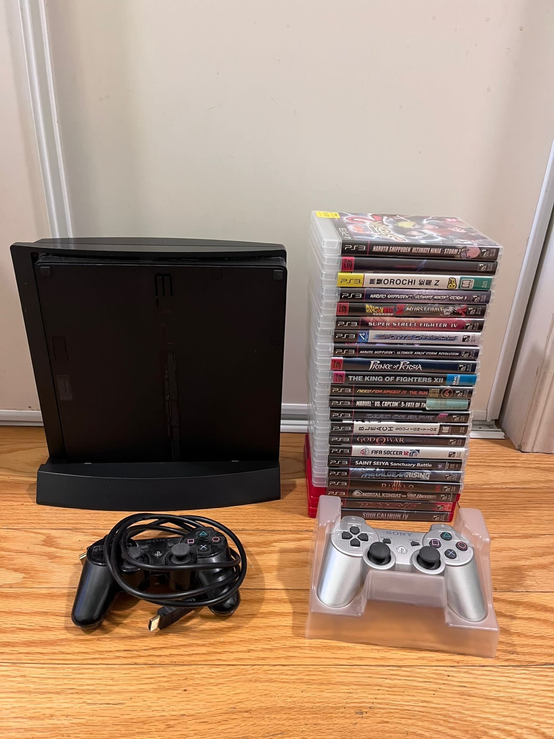 PS3 150gb slim with 22 games and 2 controllers