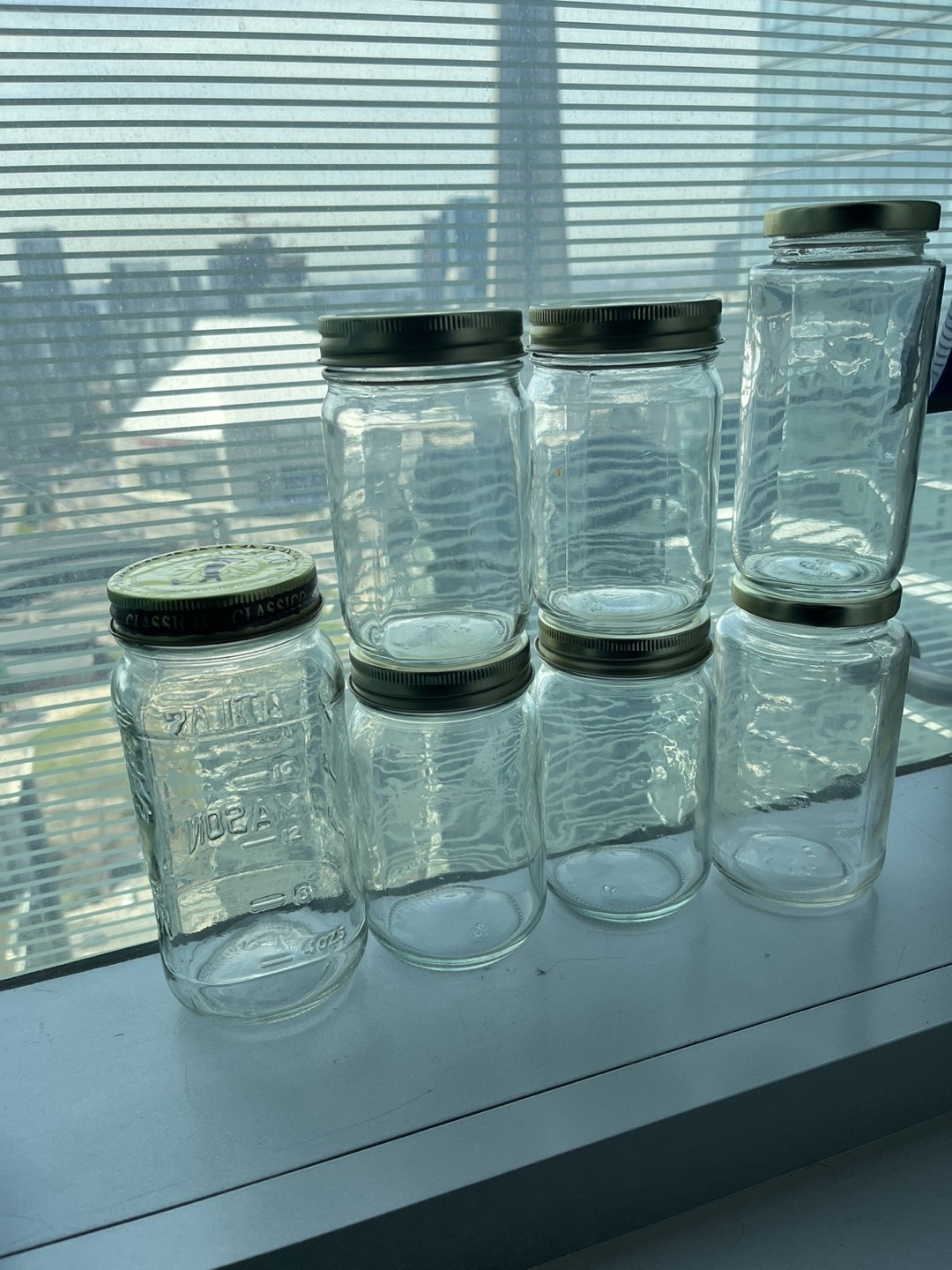 7 glass mason jars (various sizes)