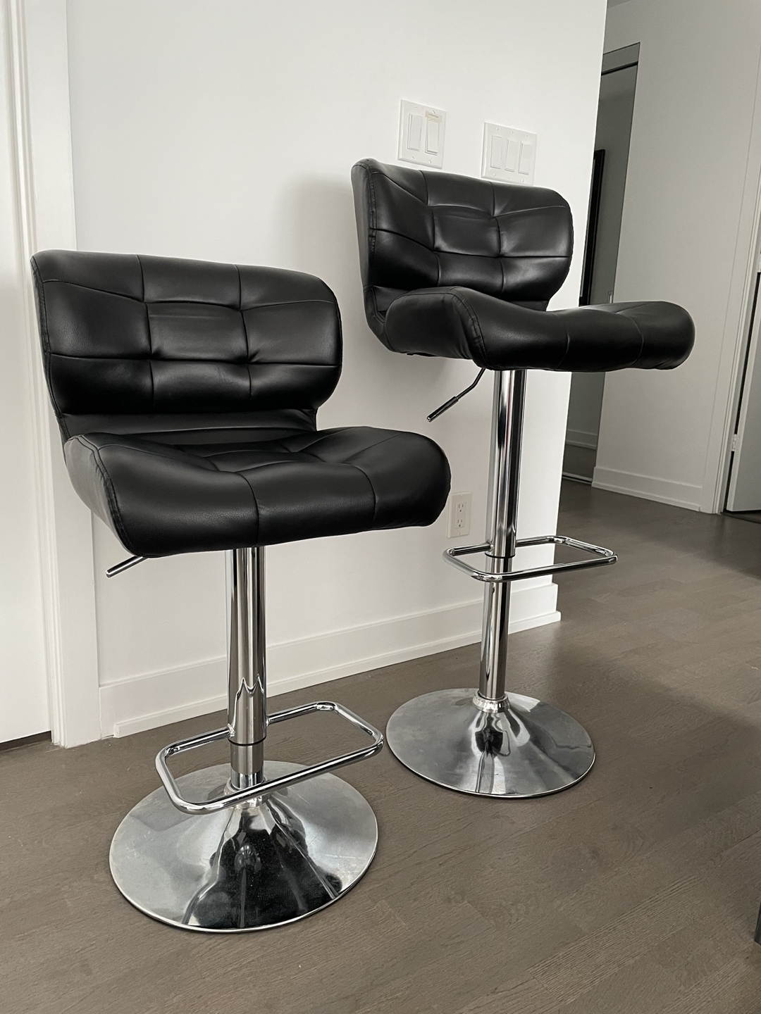 A pair of black bar stools thumbnail