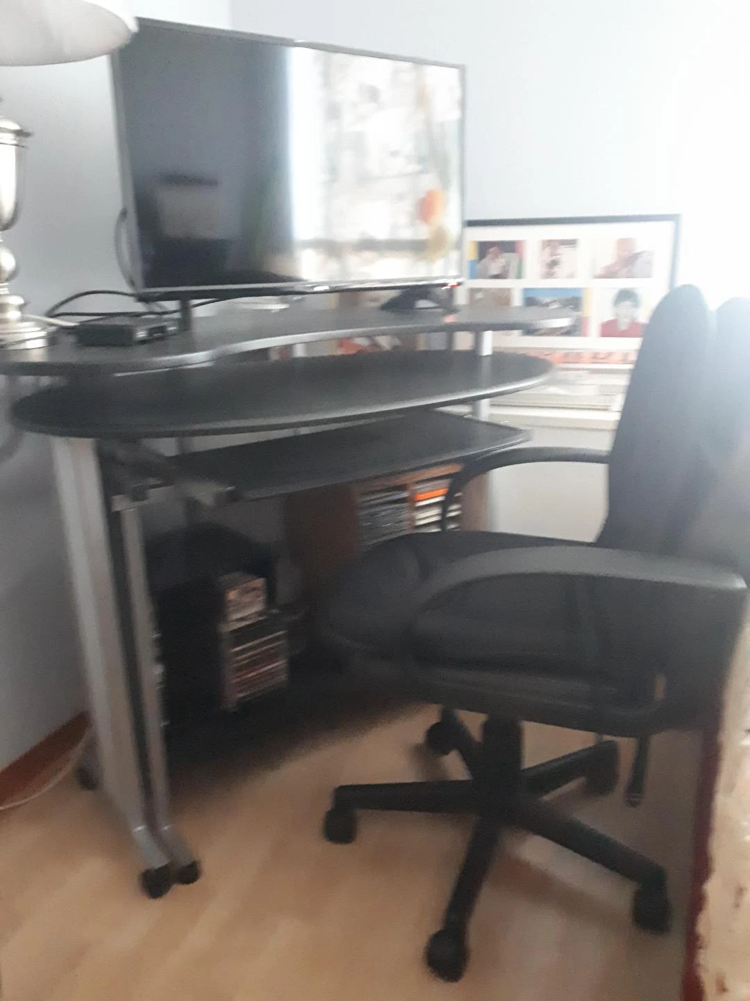 computer  desk with leather  chair with wheels