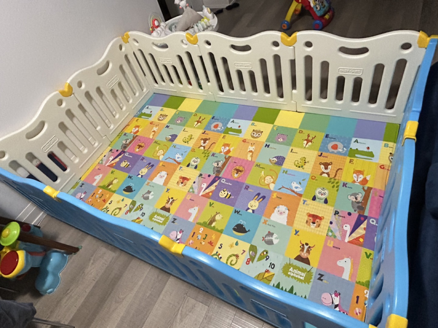 Baby care playpen with large size playmat