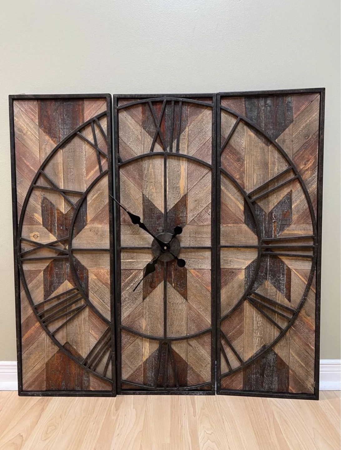 3 panel metal and wooden wall clock