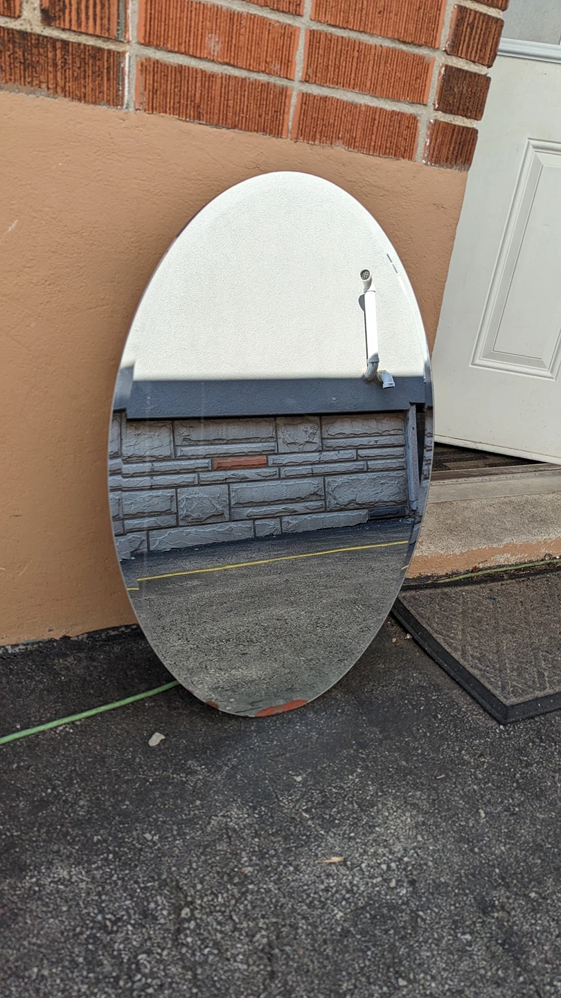 Large Oval Mirror with medicine cabinet thumbnail