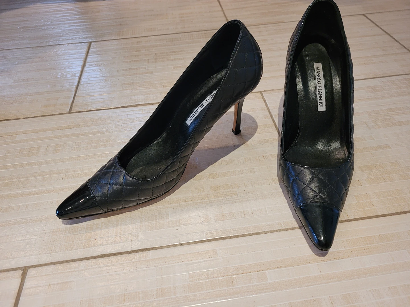 Manolo Blahnik black leather pumps
