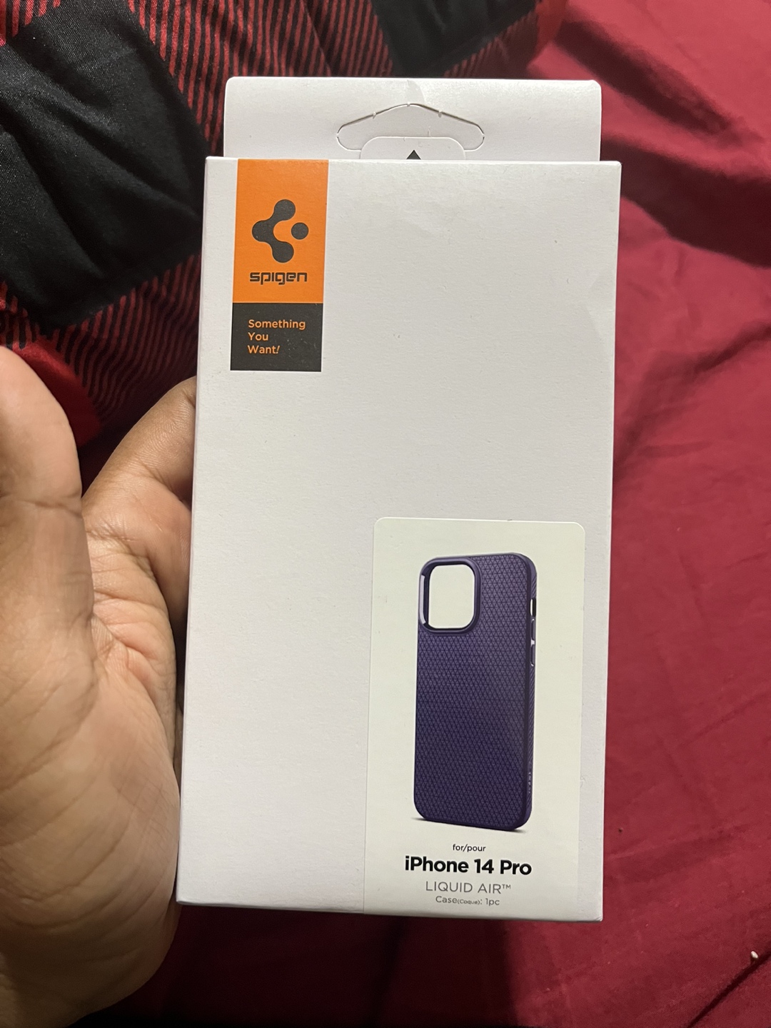 Spigen iPhone 14 pro case purple color.
