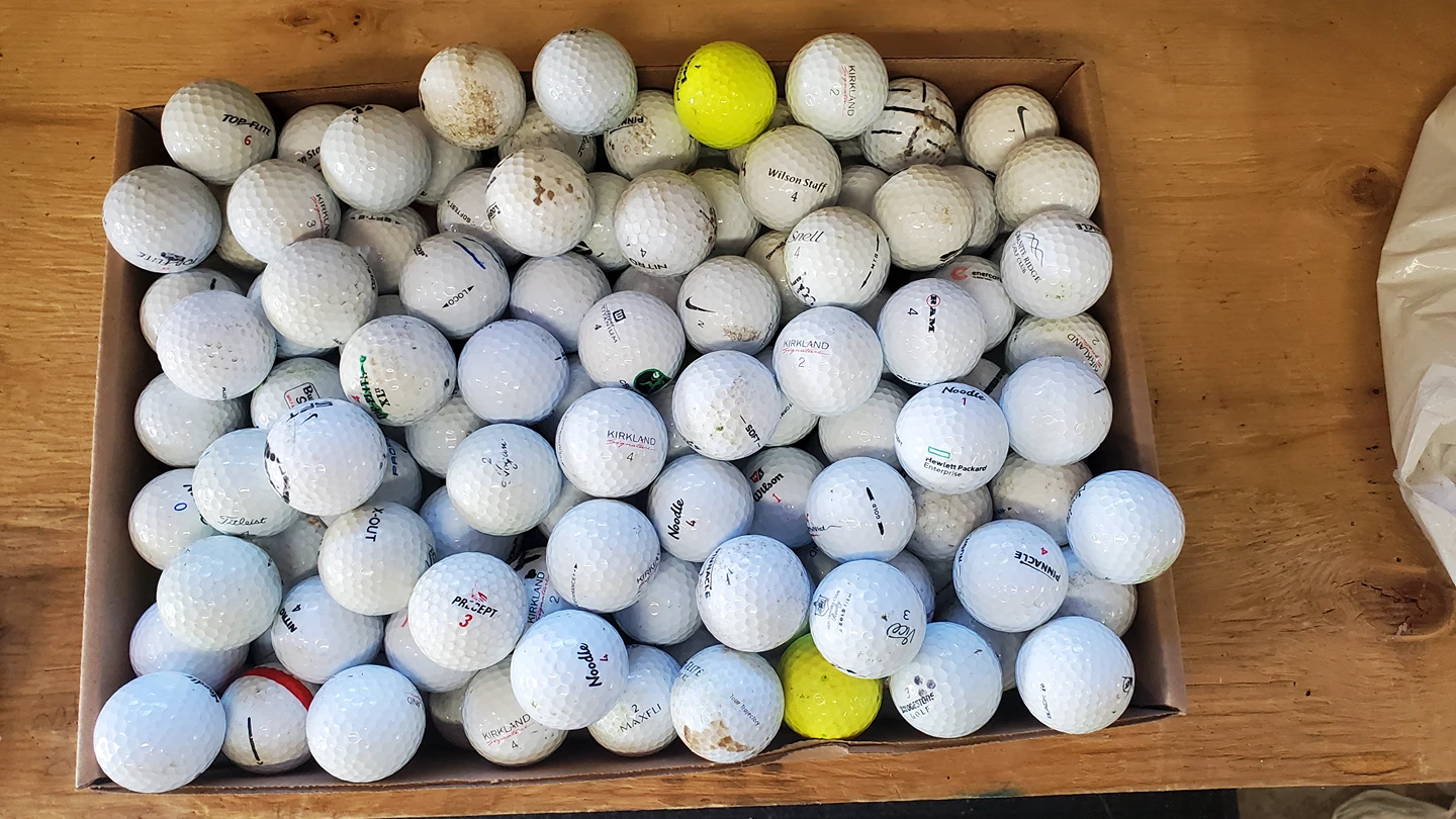 153 pcs. used golf balls