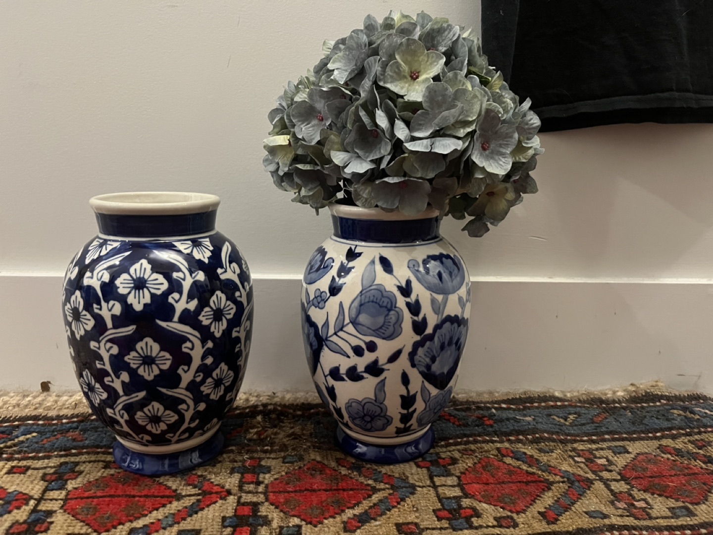 2 blue and white ceramic vases