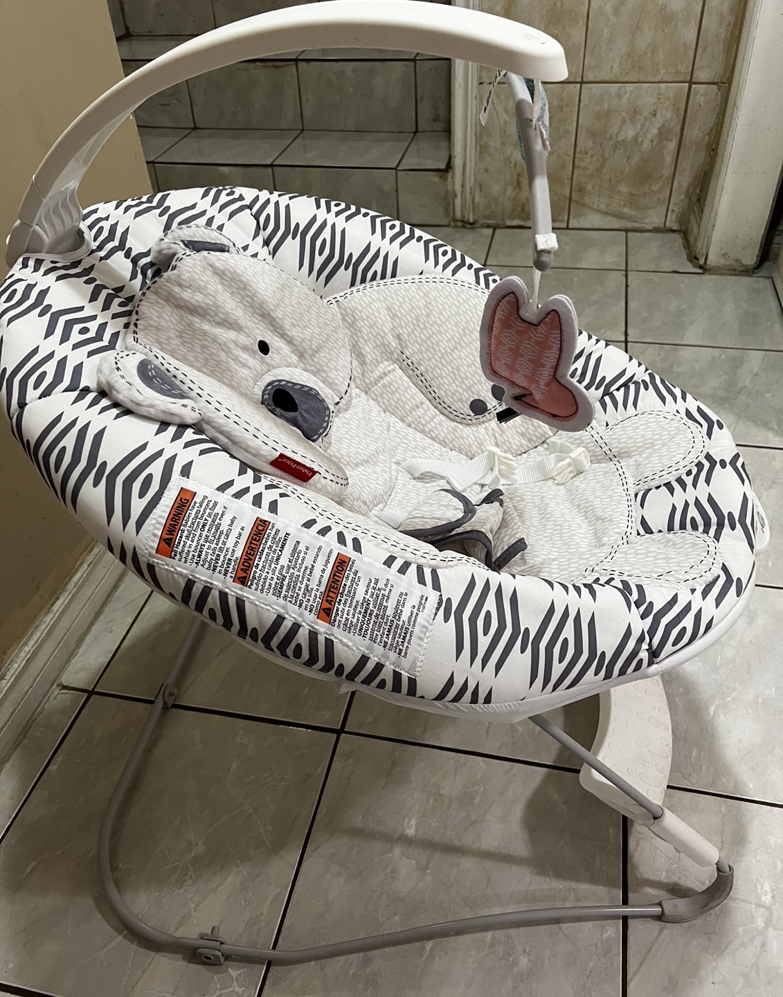 Baby bouncing chair with vibration and music.