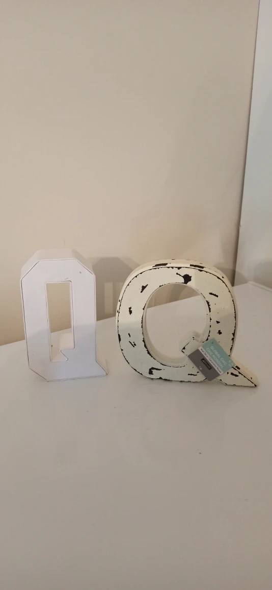 2 letter "Q"s