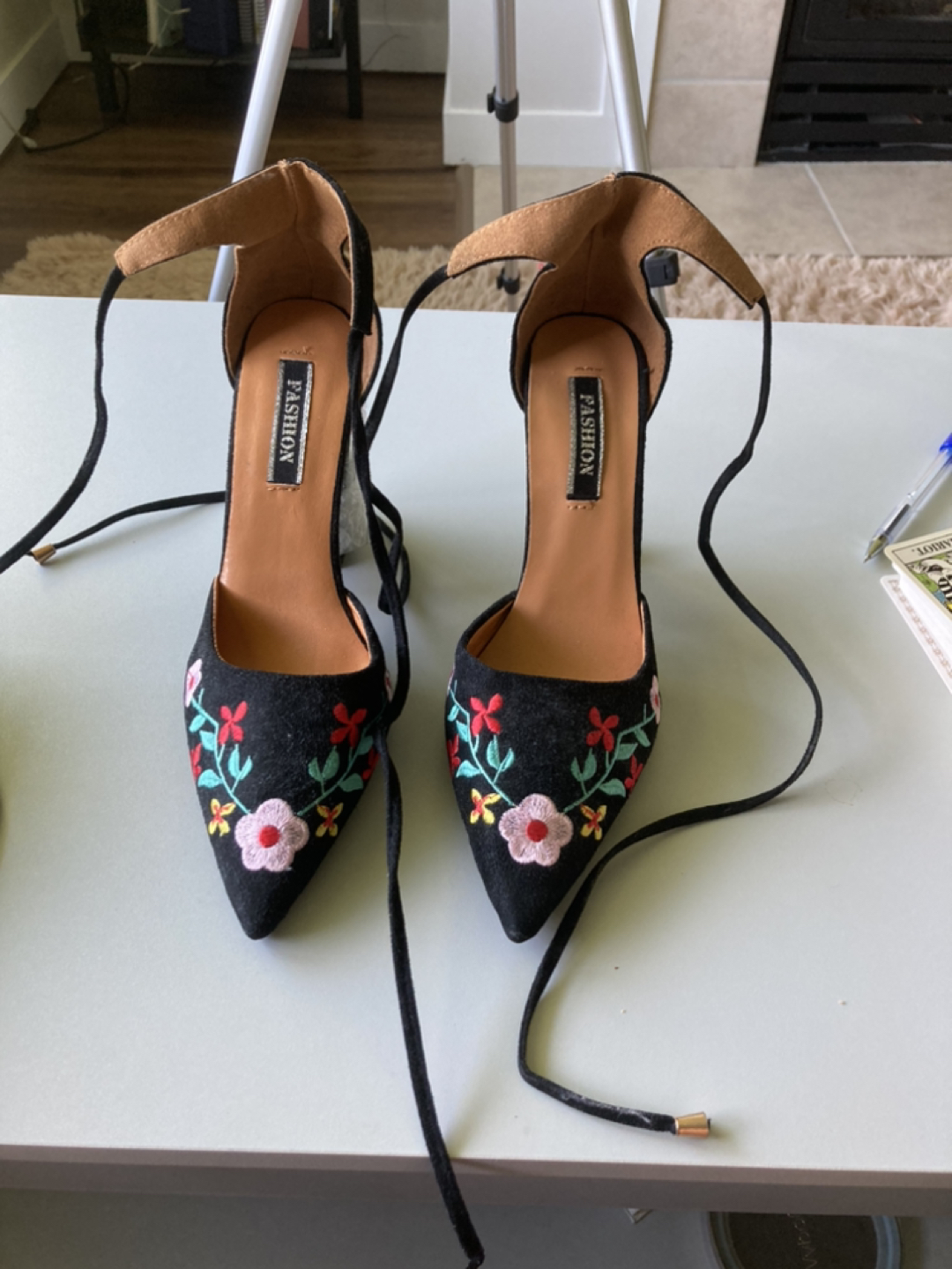 Black shoes with floral pattern