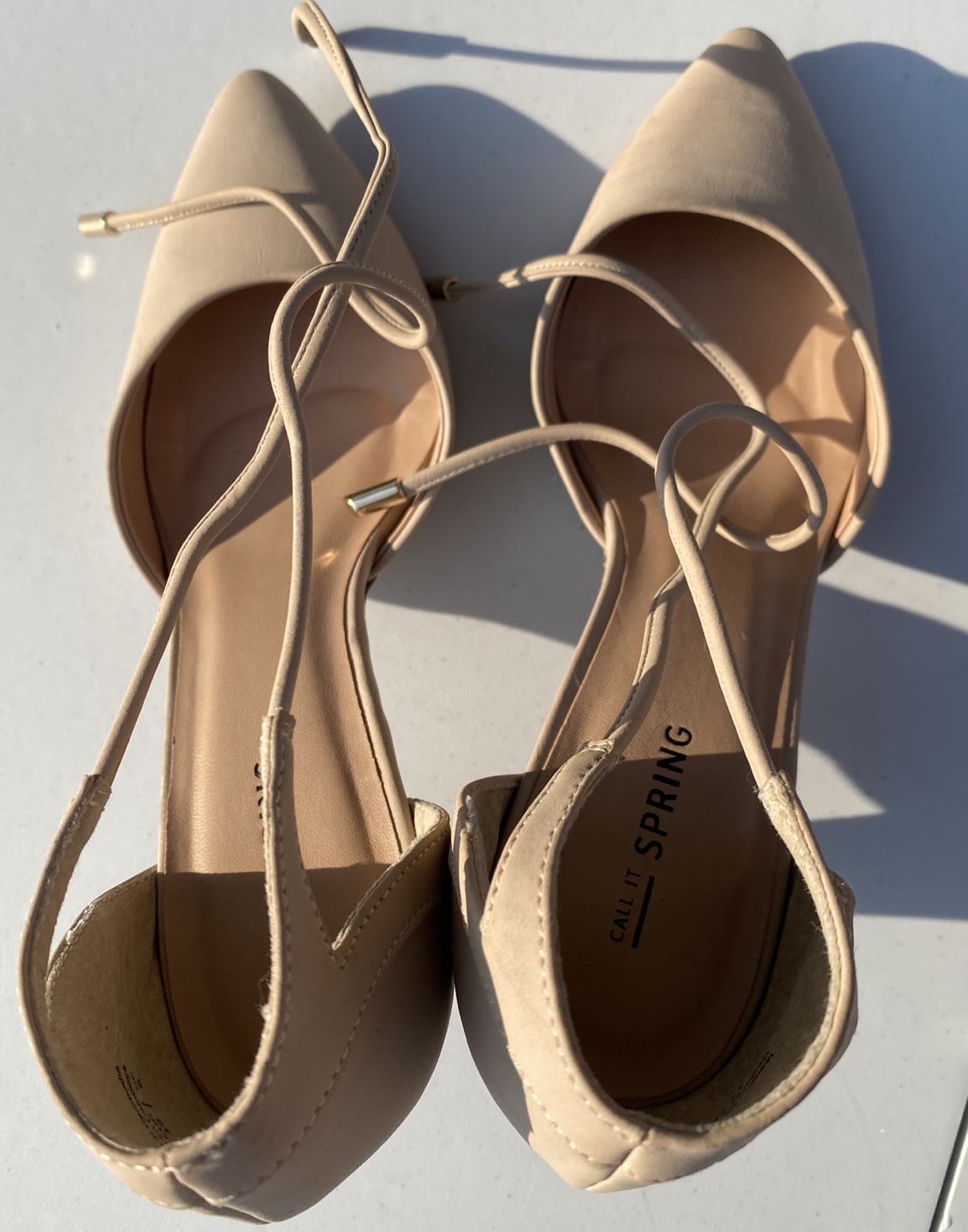 Pointed high heels