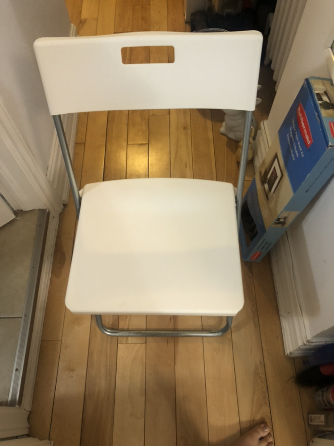 White IKEA folding chair thumbnail