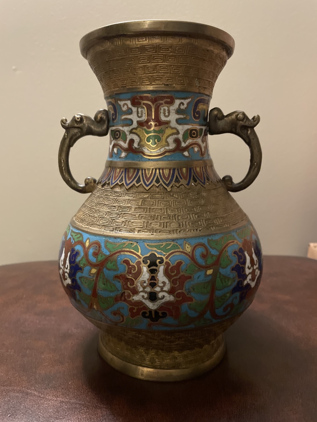 Metal vase with ceramic design thumbnail