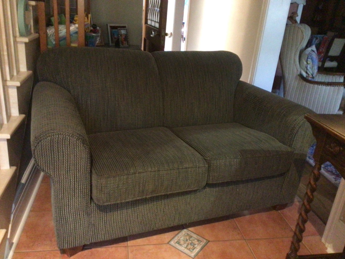 Couch. Two seater   In used condition. No rips or tears