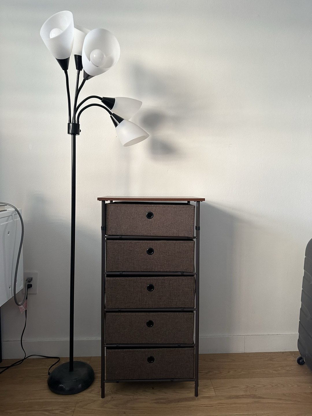 An adjustable lamp and a foldable organizer