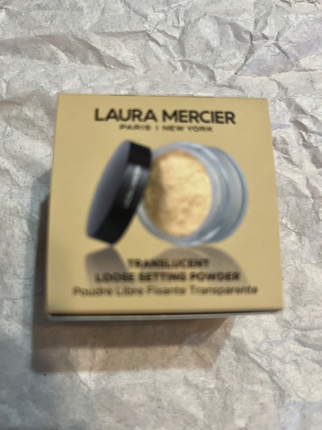 Laura Mercier translucent loose setting powder in shade honey