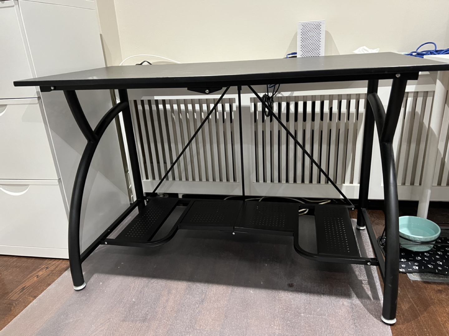 Sturdy black desk with metal frame
