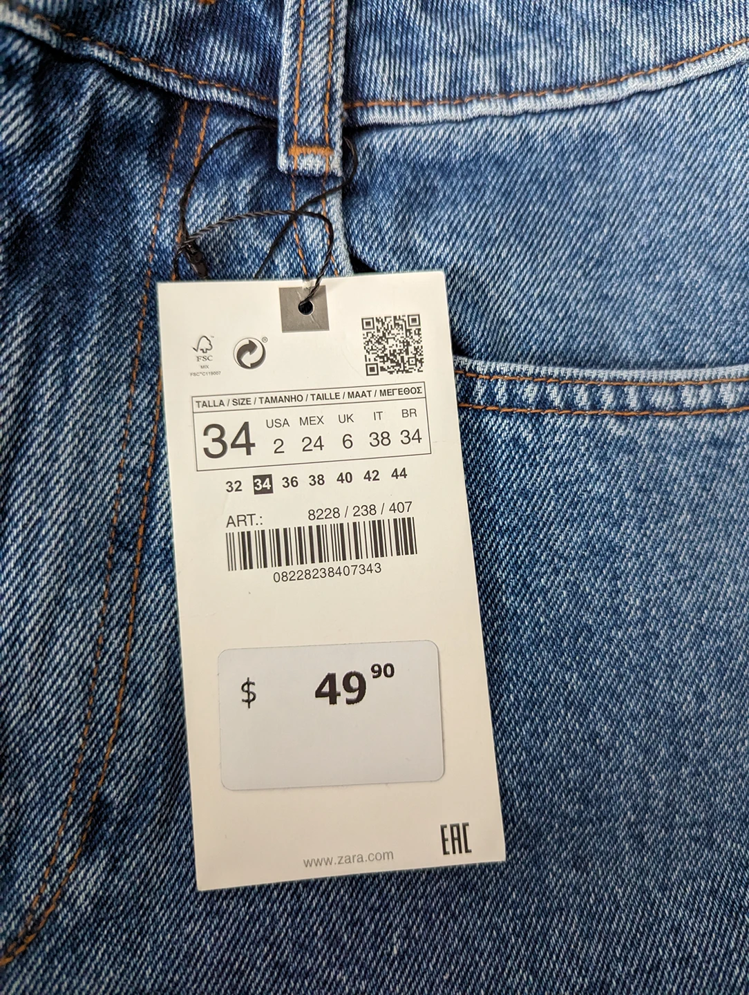 size 34 jeans tags on image indicator(2)