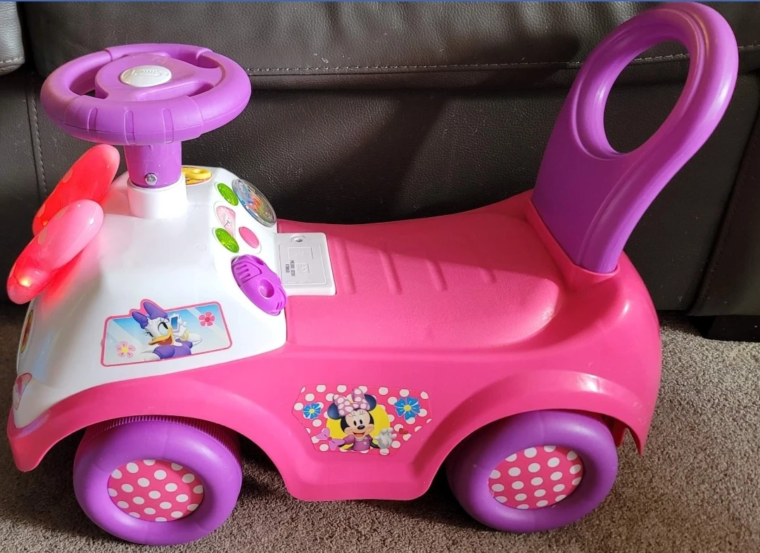 Minnie mouse lights & sounds ride on - $20 - photo 2