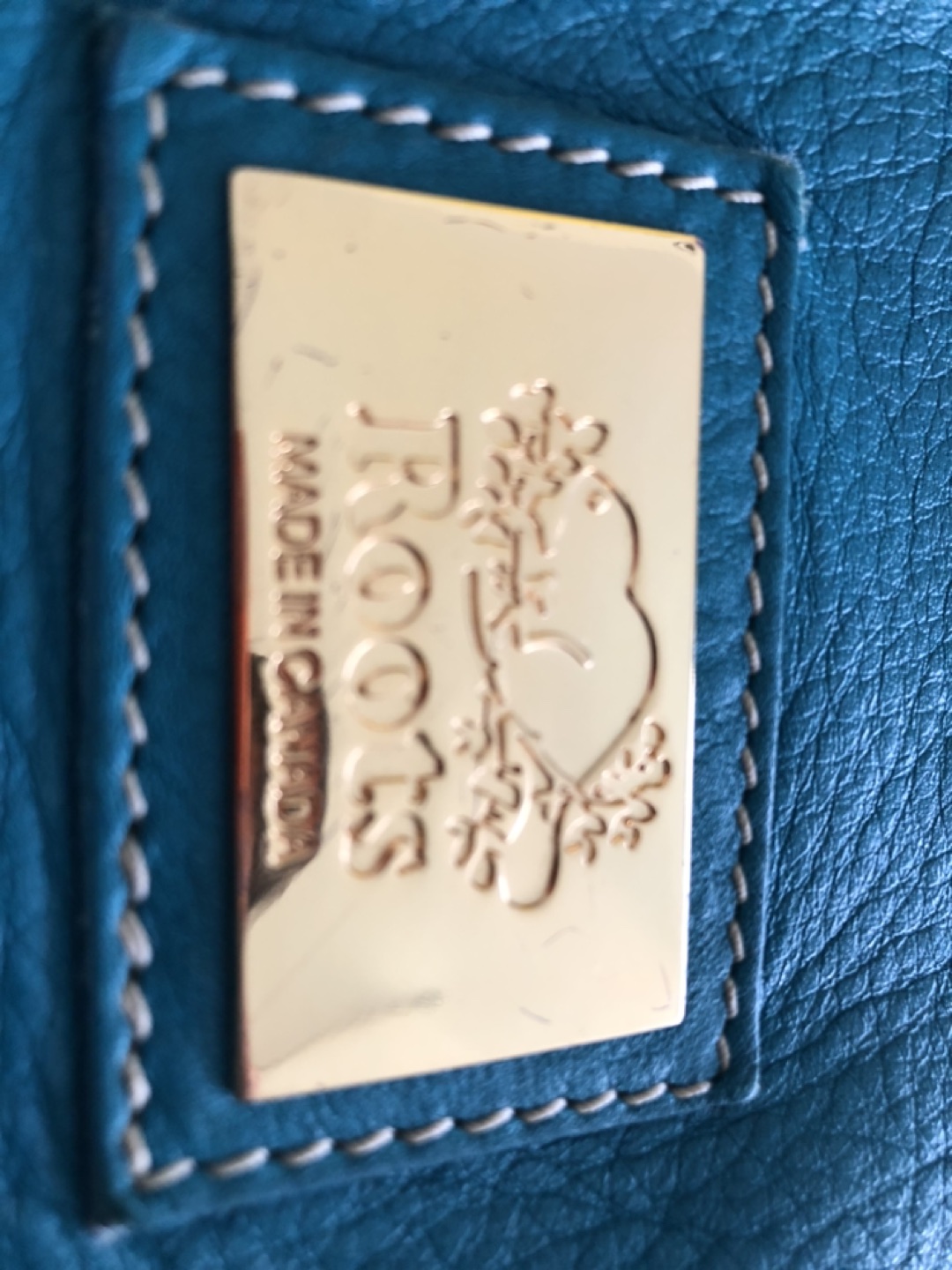 Small turquoise ROOTS purse image indicator(3)