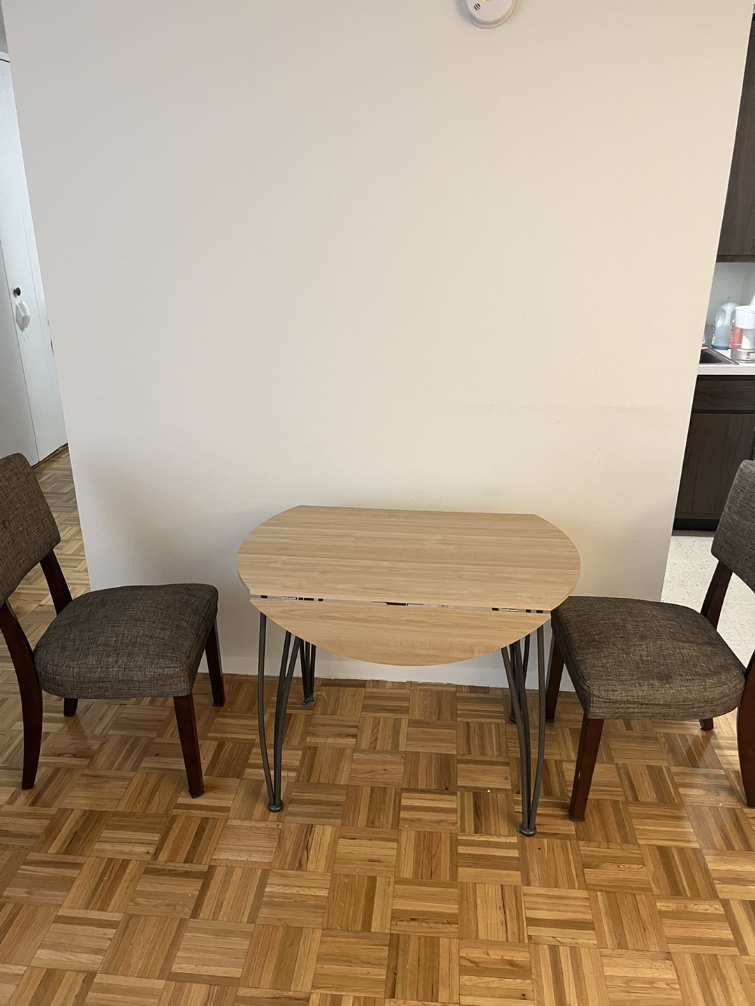 Round dining table + two chairs