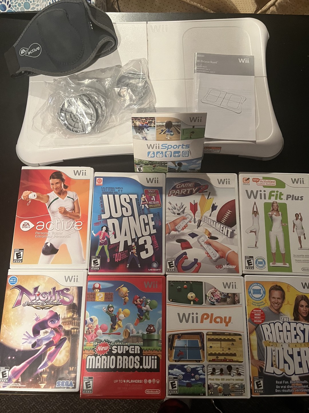 Wii balance board & games thumbnail
