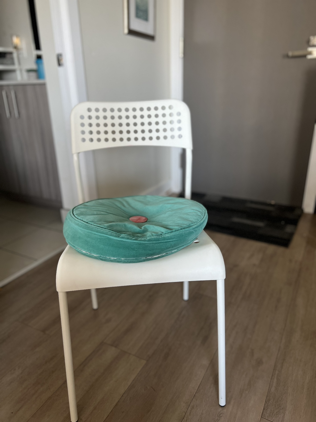 Chair with cushion. Was used for kids workstation