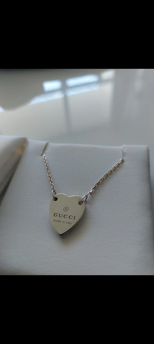 Gucci Silver Trademark bracelet with heart pendant