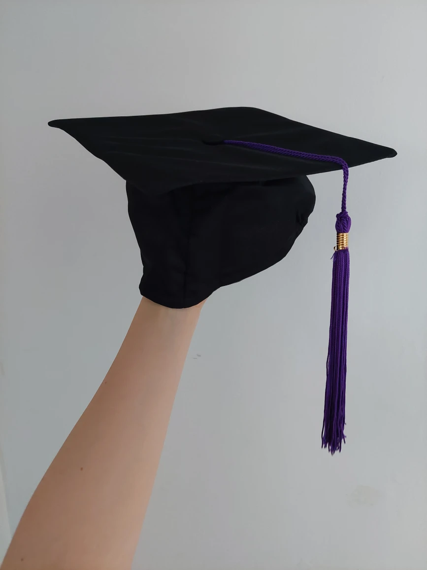 Graduation Cap with purple tassels