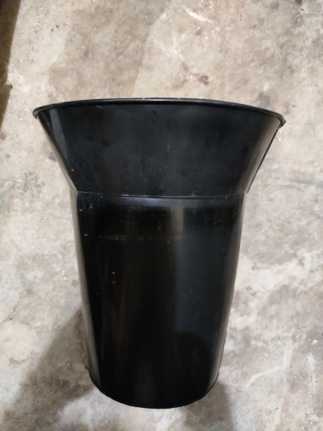 metal bucket or planter