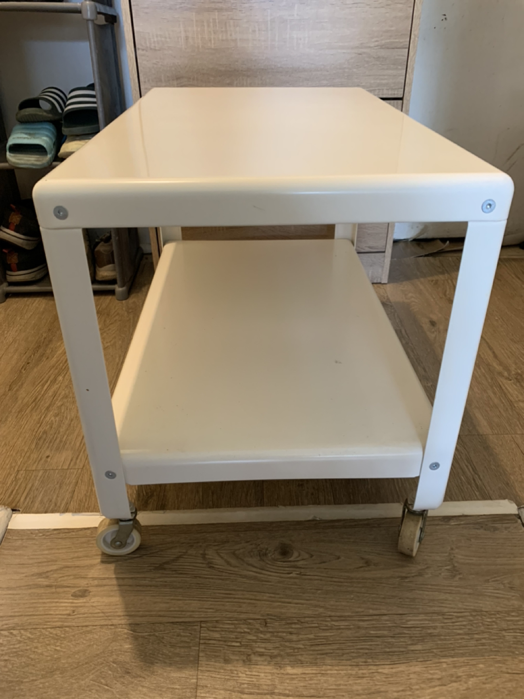 Used STRIND coffee table’s two-tier design. - photo 5