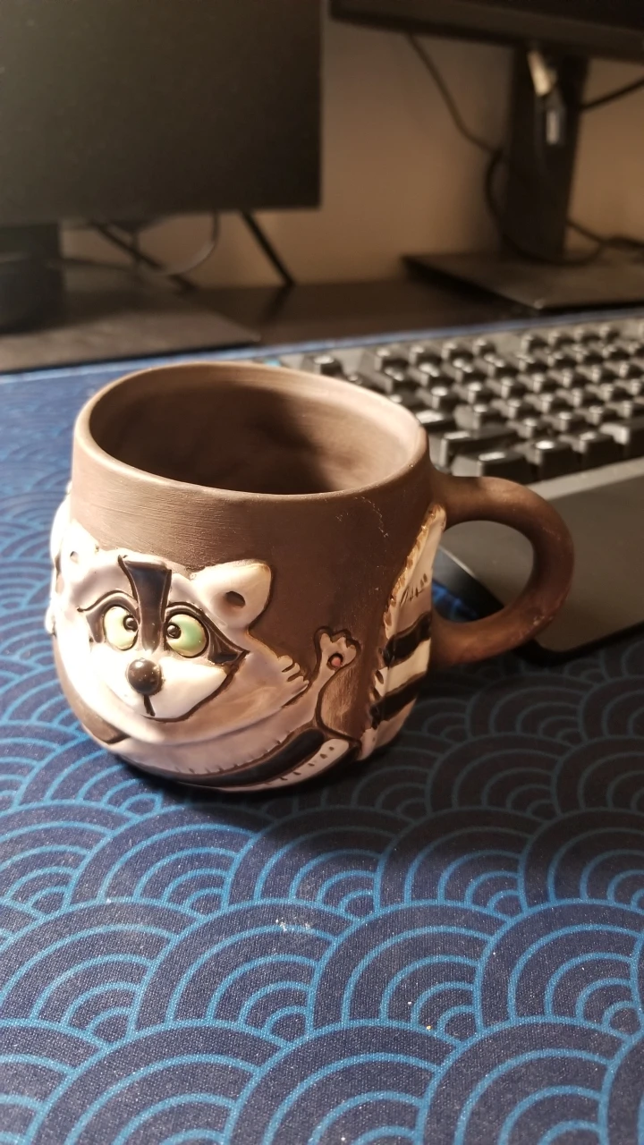 Cute handmade raccoon clay coffee cup