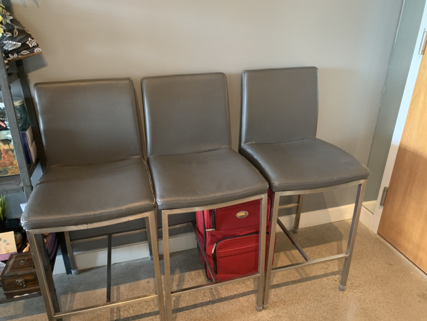3 grey bar stools